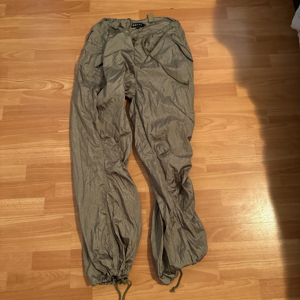 Olive green parachute pants.